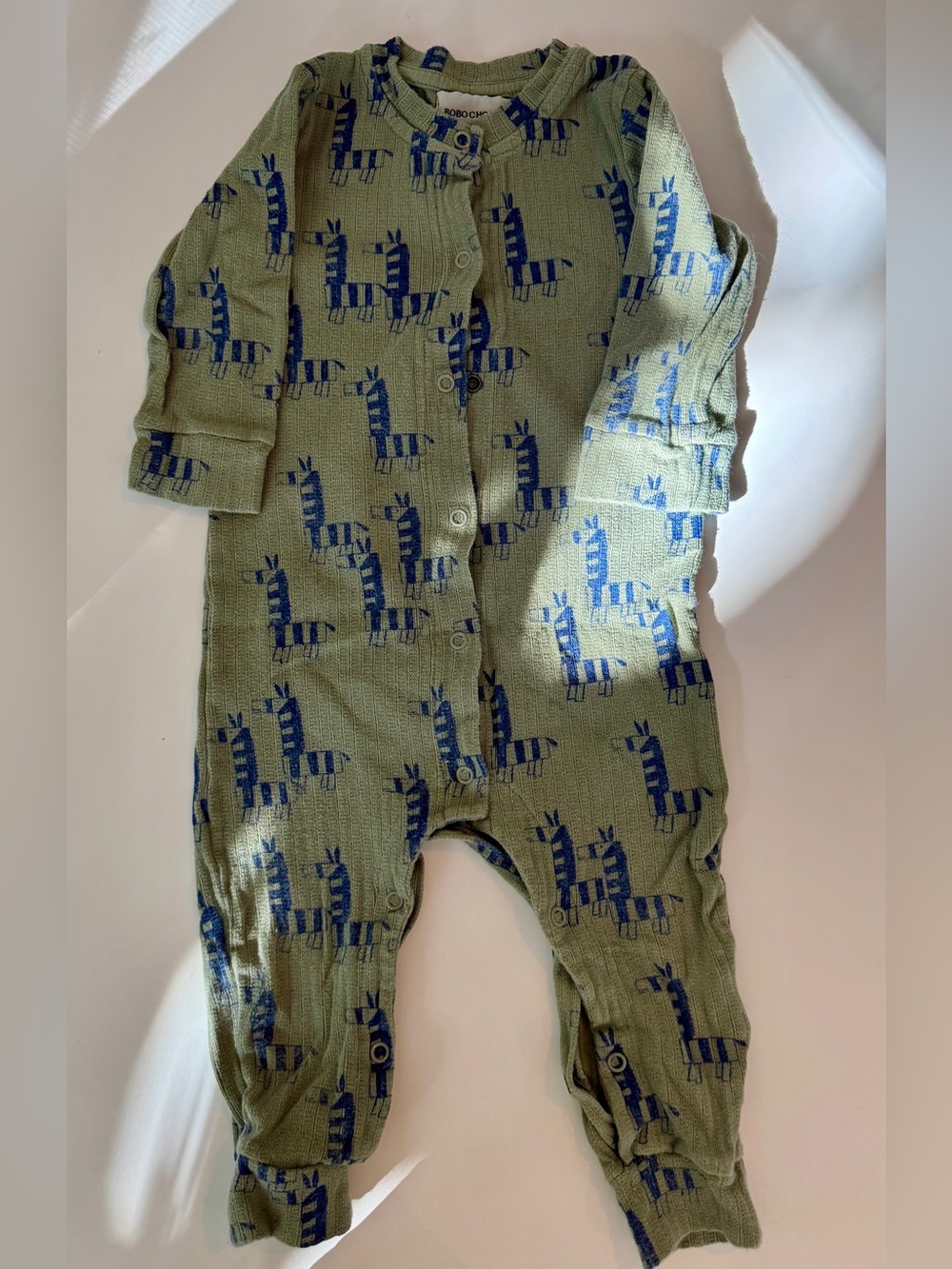 Bobo Choses Olive Green Footie with Blue Zebra Pattern